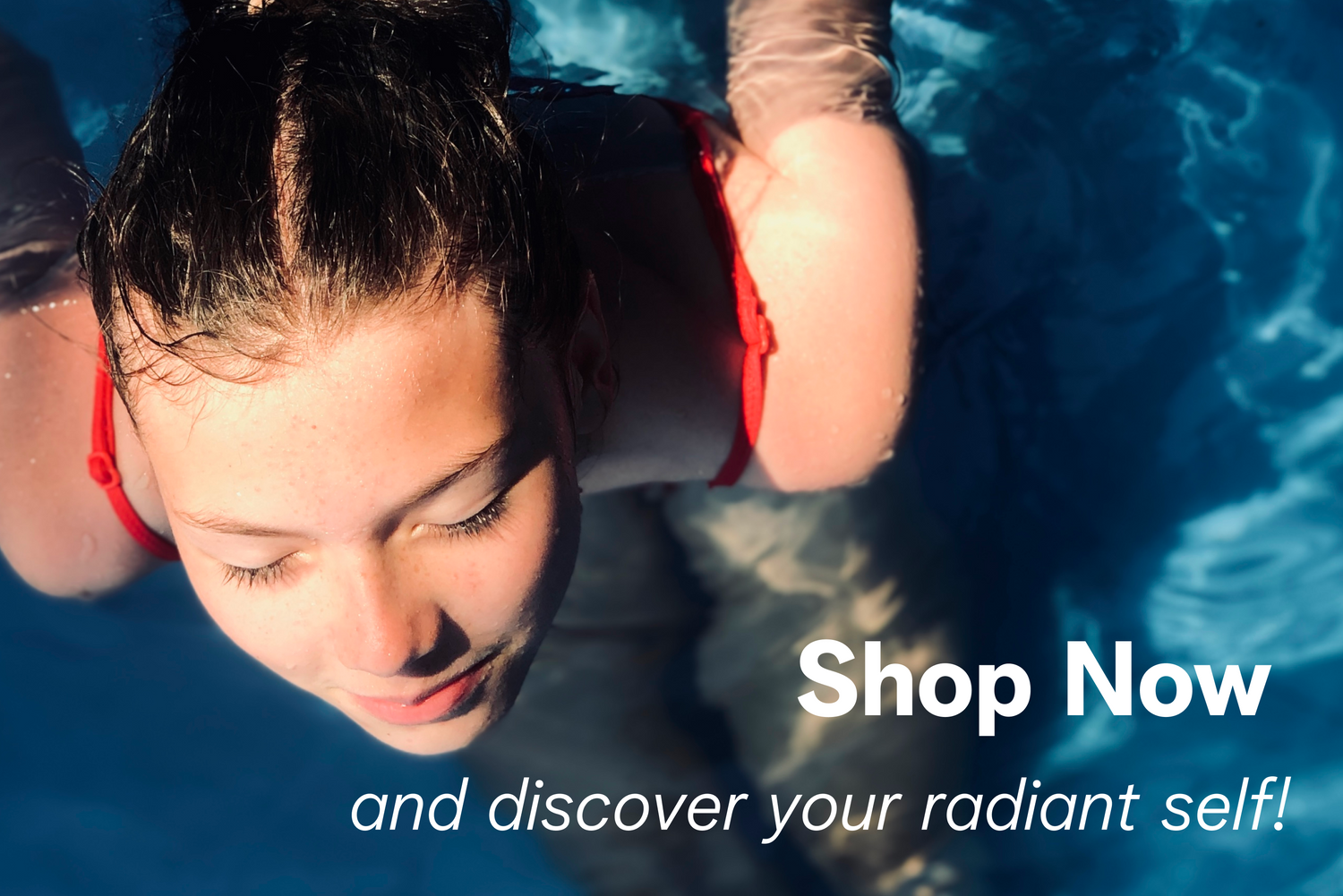 Person swimming underwater with promotional text 'Shop Now and discover your radiant self!'